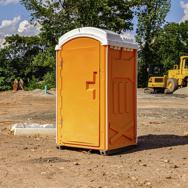 what is the cost difference between standard and deluxe portable restroom rentals in Brown County NE